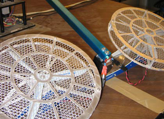Reduced degree-of-freedom helicopter apparatus. Reduced degree-of-freedom helicopter apparatus.