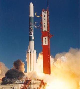 Photo of a Delta II Rocket launch. Photo of a Delta II Rocket launch.