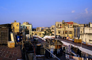 A photo of the rooftops of Havana, Cuba with lots of clotheslines visible. A photo of the rooftops of Havana, Cuba with lots of clotheslines visible.