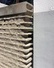 A photo of an adobe wall at the Judd Foundation.