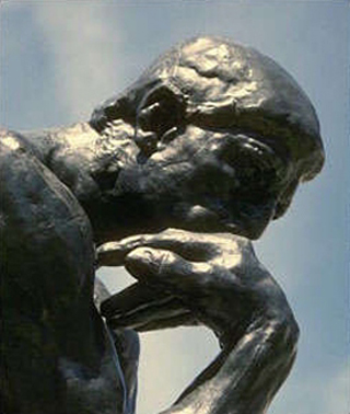 A close-up photo of Rodin's famous sculpture. A close-up photo of Rodin's famous sculpture.