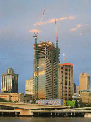 A high-rise building under construction. A high-rise building under construction.