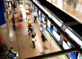 Passengers boarding a subway in Madrid. Passengers boarding a subway in Madrid.