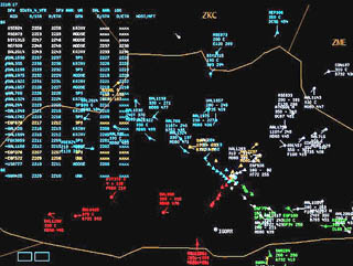 Screen shot of air traffic management software showing many colored regions representing planes. Screen shot of air traffic management software showing many colored regions representing planes.