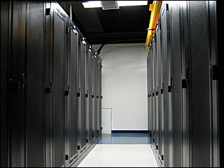 Photograph taken inside One Wilshire of the cabinets used to hold networking equipment. Photograph taken inside One Wilshire of the cabinets used to hold networking equipment.