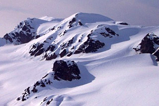Photograph of a snow-covered glacier. Photograph of a snow-covered glacier.
