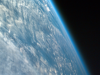 Oblique shot of the Earth from space featuring its curvature and atmosphere. Oblique shot of the Earth from space featuring its curvature and atmosphere.