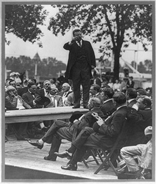 Theodore Roosevelt making a speech. Theodore Roosevelt making a speech.