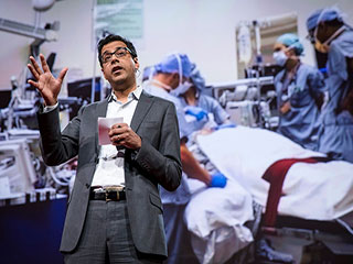 A photo of Atul Gawande, who is a well known surgeon and science writer, speaking at a TED conference. A photo of Atul Gawande, who is a well known surgeon and science writer, speaking at a TED conference.