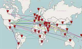 A world map where each of the continents have several push pin icons on them. The various push pins are connected to each other with multi-colored lines. A world map where each of the continents have several push pin icons on them. The various push pins are connected to each other with multi-colored lines.