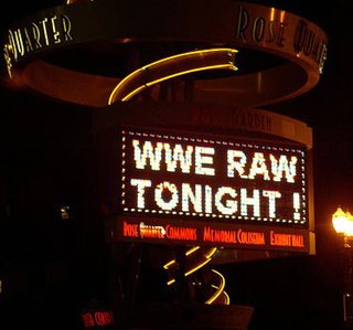 A neon sign announces WWE Raw. A neon sign announces WWE Raw.