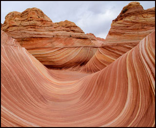 A photograph of Coyote Buttes, a red-rock formation. A photograph of Coyote Buttes, a red-rock formation.