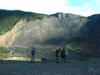 Students examining the aftermath of a landslide Students examining the aftermath of a landslide