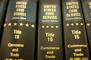 Photograph of book spines for US Title 15 Commerce regulations. Photograph of book spines for US Title 15 Commerce regulations.
