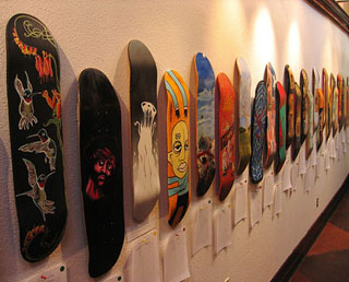 Silent auction of skateboard boards. Silent auction of skateboard boards.