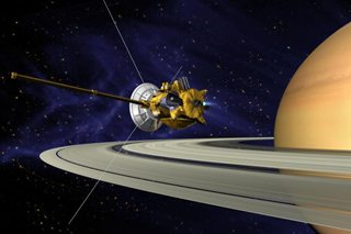 Artist's depiction of the Cassini spacecraft, with Saturn in the foreground and a dark blue, starry background. Artist's depiction of the Cassini spacecraft, with Saturn in the foreground and a dark blue, starry background.