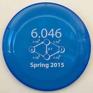 A picture of a blue frisbee with a four node graph printed on it. A picture of a blue frisbee with a four node graph printed on it.