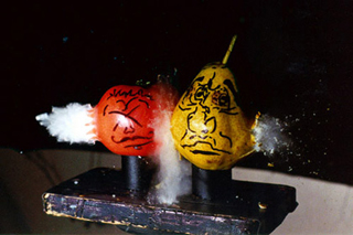 A bullet shot through fruit. A bullet shot through fruit.