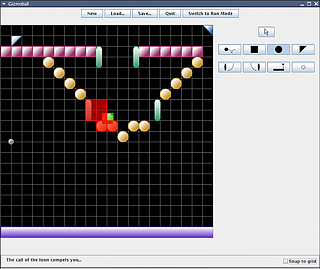 Gizmoball game in progress, with colored elements on a black background. Gizmoball game in progress, with colored elements on a black background.