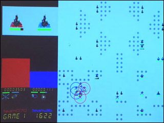 Screen showing soldiers from competing sides, red and blue, fighting. Screen showing soldiers from competing sides, red and blue, fighting.