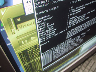 Photo of a computer screen showing several overlapping applications. Photo of a computer screen showing several overlapping applications.