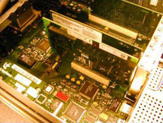 Photo of the inside of a computer. Photo of the inside of a computer.