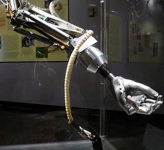 A photo of the Minsky Arm, a robotic arm, taken at the MIT Museum. A photo of the Minsky Arm, a robotic arm, taken at the MIT Museum.