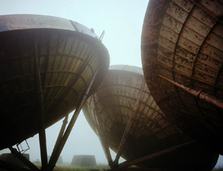 Rusty satellite dishes. Rusty satellite dishes.
