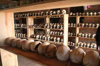 Skulls of Rwandan genocide victims, lined up on shelves. Skulls of Rwandan genocide victims, lined up on shelves.