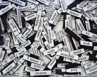 English magnetic poetry laid over a French dictionary. English magnetic poetry laid over a French dictionary.