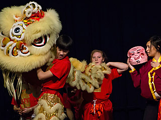 Three performers of Chinese Lion Dance. Three performers of Chinese Lion Dance.