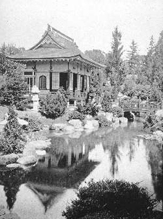 A black and white photo of a stream with a bridge, and a pagoda. A black and white photo of a stream with a bridge, and a pagoda.