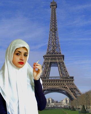 A woman wearing a chador head-scarf smokes a cigarette with the Eiffel Tower in the background. A woman wearing a chador head-scarf smokes a cigarette with the Eiffel Tower in the background.