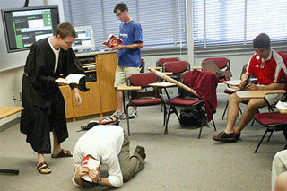 Photos of students interacting in class. Photos of students interacting in class.
