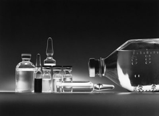 Glass vials and bottles containing chemotherapy drugs. Glass vials and bottles containing chemotherapy drugs.