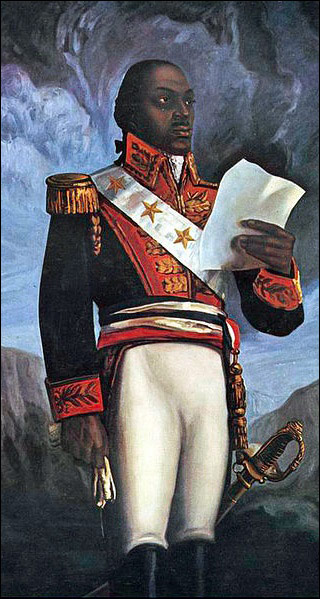 A painting of Général Toussaint Louverture in a formal military uniform, carrying a sword and reading from a sheet of paper. A painting of Général Toussaint Louverture in a formal military uniform, carrying a sword and reading from a sheet of paper.