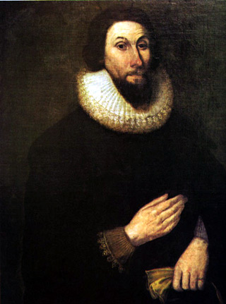 Oil painting of a middle-aged man with dark brown hair and beard, dressed in black with fine lace at the wrists and neck. Oil painting of a middle-aged man with dark brown hair and beard, dressed in black with fine lace at the wrists and neck.