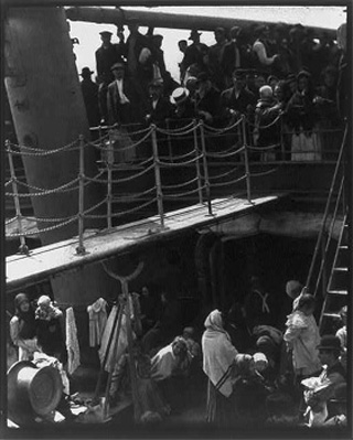 Black/white photo of immigrants on steerage deck of ship. Black/white photo of immigrants on steerage deck of ship.