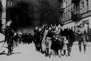 A photograph of jewish civilians during the destruction of the Warsaw Ghetto, 1943. A photograph of jewish civilians during the destruction of the Warsaw Ghetto, 1943.