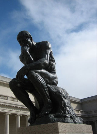 Photograph of bronze sculpture. Photograph of bronze sculpture.