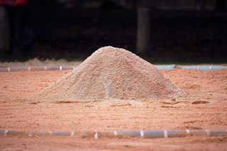 A pile of sand. A pile of sand.