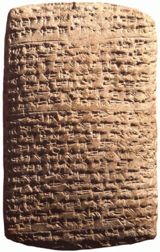 A baked clay tablet with Akkadian cuneiform. A baked clay tablet with Akkadian cuneiform.
