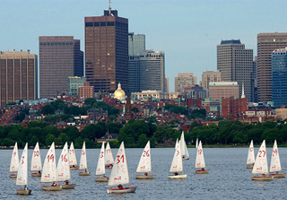 Photograph of boats on Charles River with city of Boston in the background. Photograph of boats on Charles River with city of Boston in the background.
