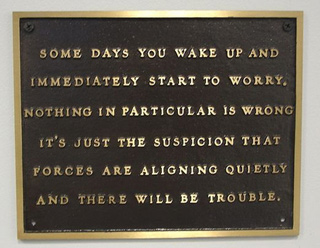 Plaque showing a Jenny Holzer poem engraving. Plaque showing a Jenny Holzer poem engraving.