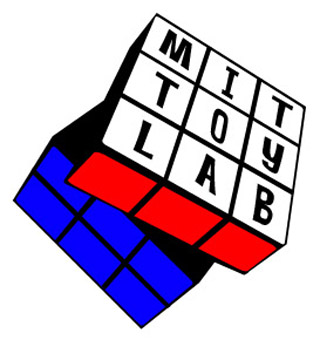 MIT Toy Lab logo: a rubik's cube. MIT Toy Lab logo: a rubik's cube.