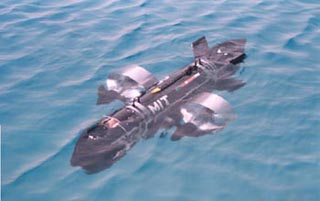 Photo of ORCA-1, an autonomous submarine, in water. Photo of ORCA-1, an autonomous submarine, in water.