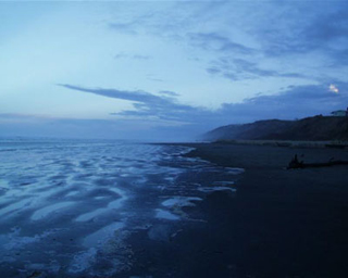 Ocean waves breaking on a beach. Ocean waves breaking on a beach.
