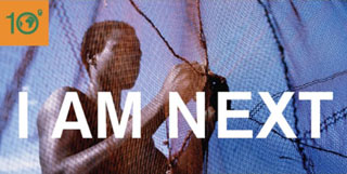 Photo of a man mending a fishing net, overlaid with the words 'I AM NEXT.' Photo of a man mending a fishing net, overlaid with the words 'I AM NEXT.'