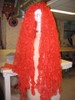 3-4 feet of red plastic mesh cascade from the top of a mannequin's head.