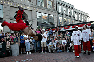 Photo of a man break dancing. Photo of a man break dancing.